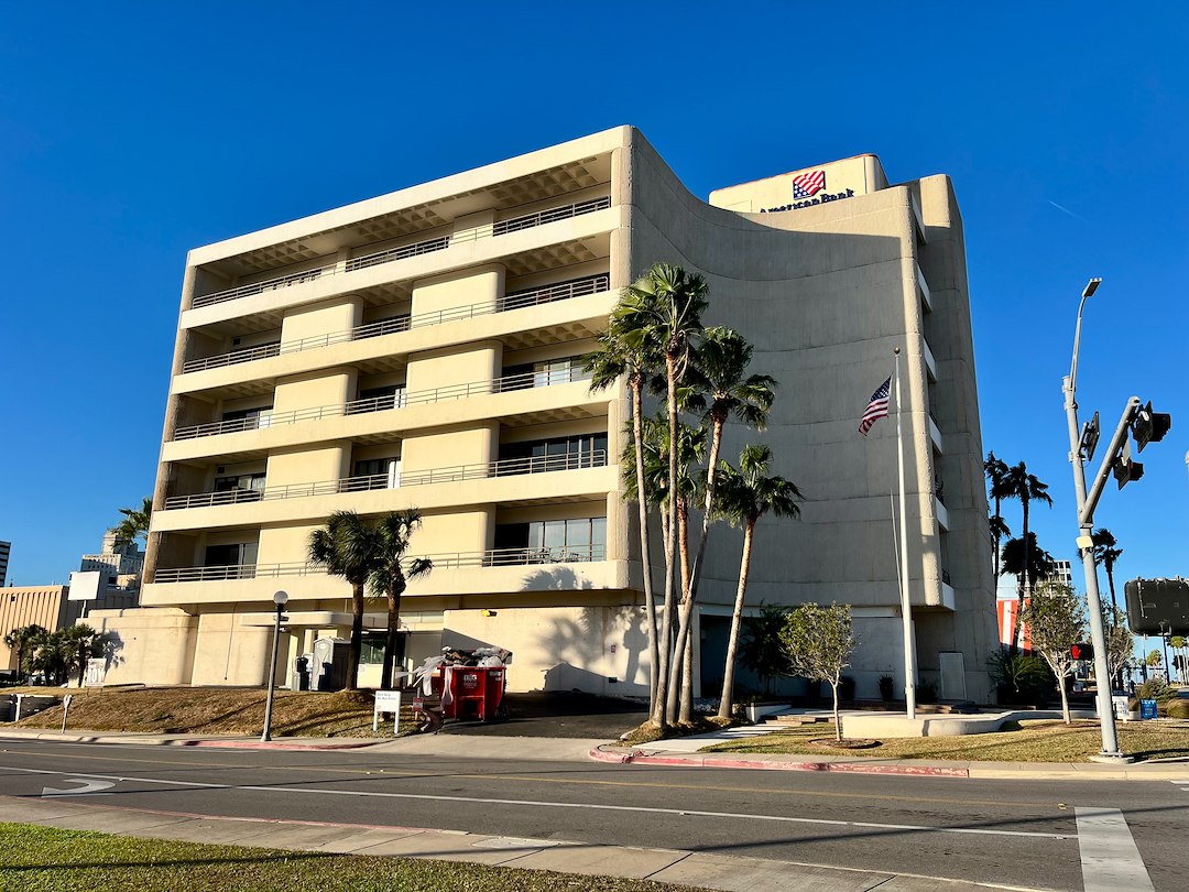 Commercial Pressure Washing at the Bay Building, Corpus Christi, TX – Restoring a Landmark with Expert Building Wash and Sidewalk Cleaning