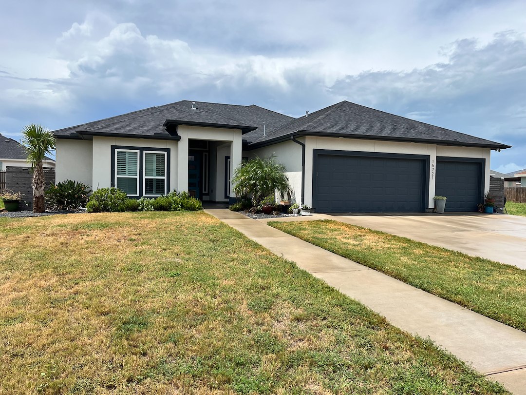 Transforming a Stucco Home in Corpus Christi: Soft Wash and Driveway Cleaning for Property Sale Prep